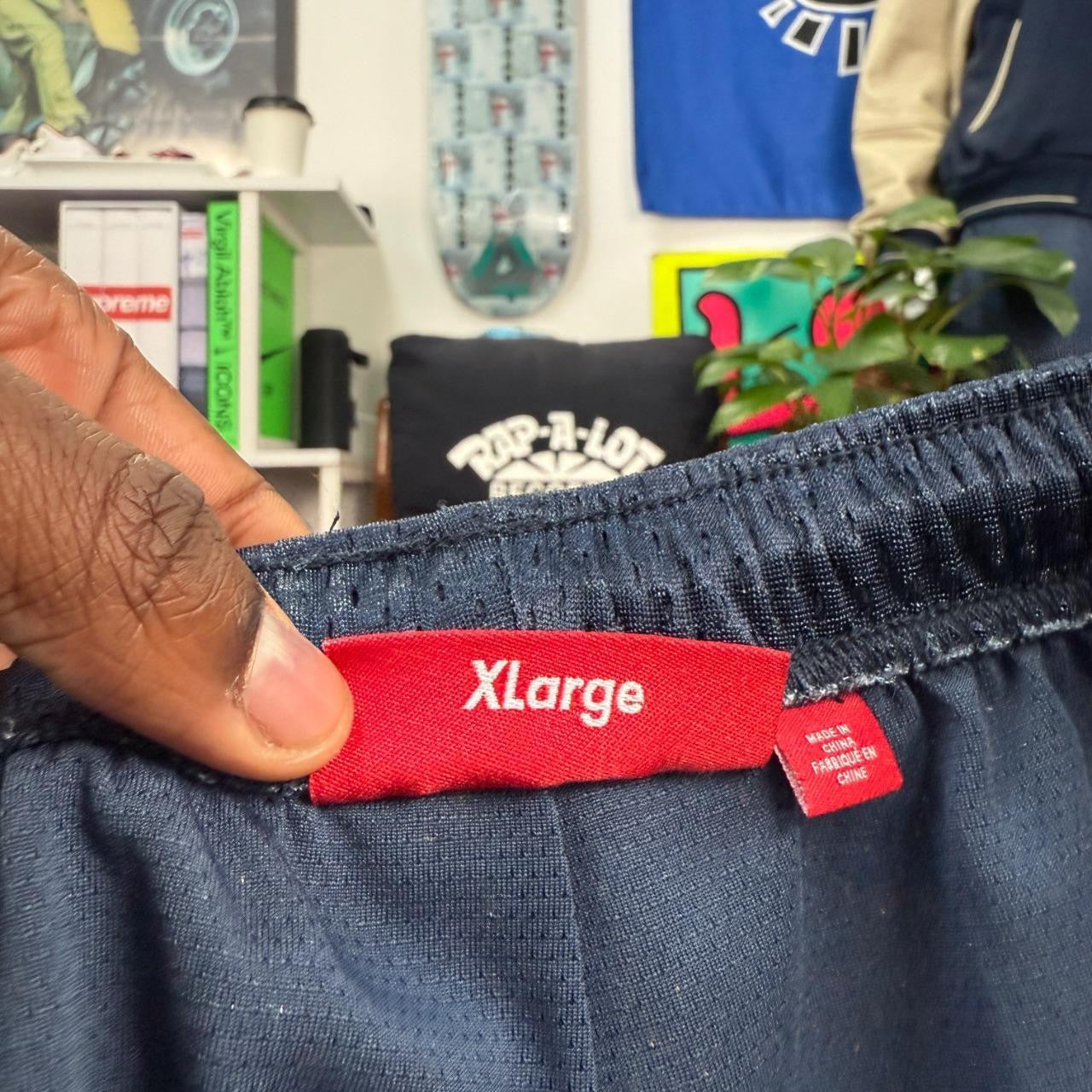 SUPREME SS25 VARSITY MESH SHORTS