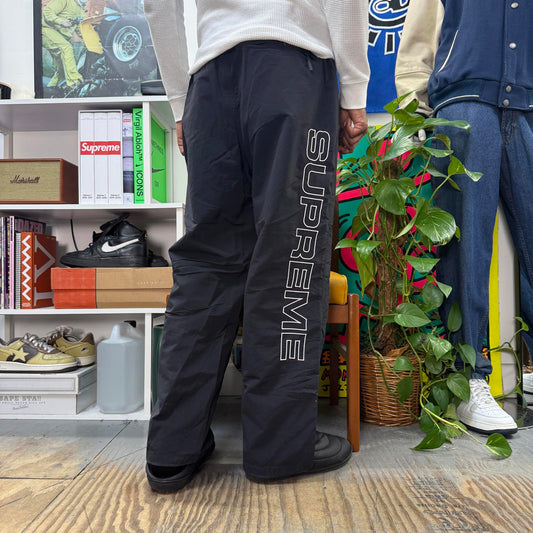 SUPREME FW24 SPELLOUT EMBROIDERED TRACK PANT