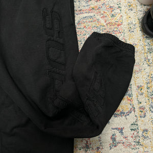 SUPREME CUTOUT LOGO JOGGERS