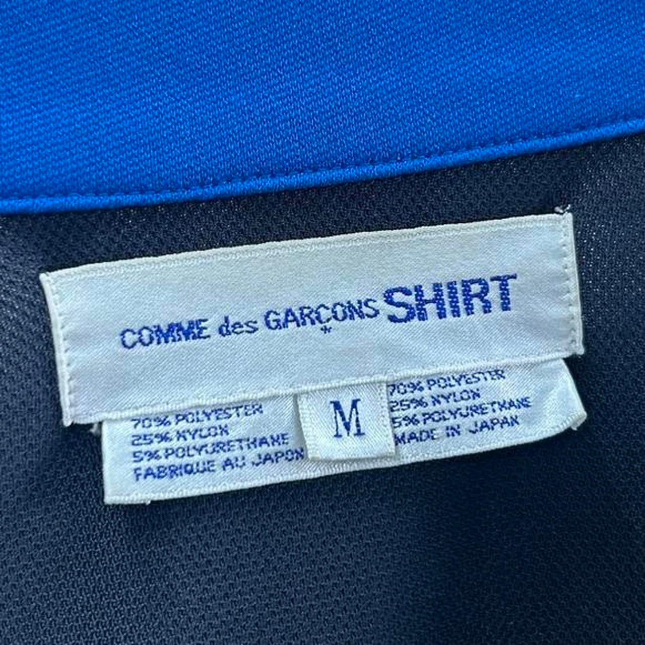 COMME DES GARCONS HYBRID TRACK JACKET