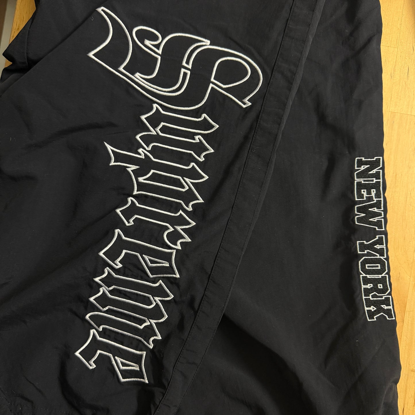 SUPREME SS25 OLD ENGLISH TRACK PANT