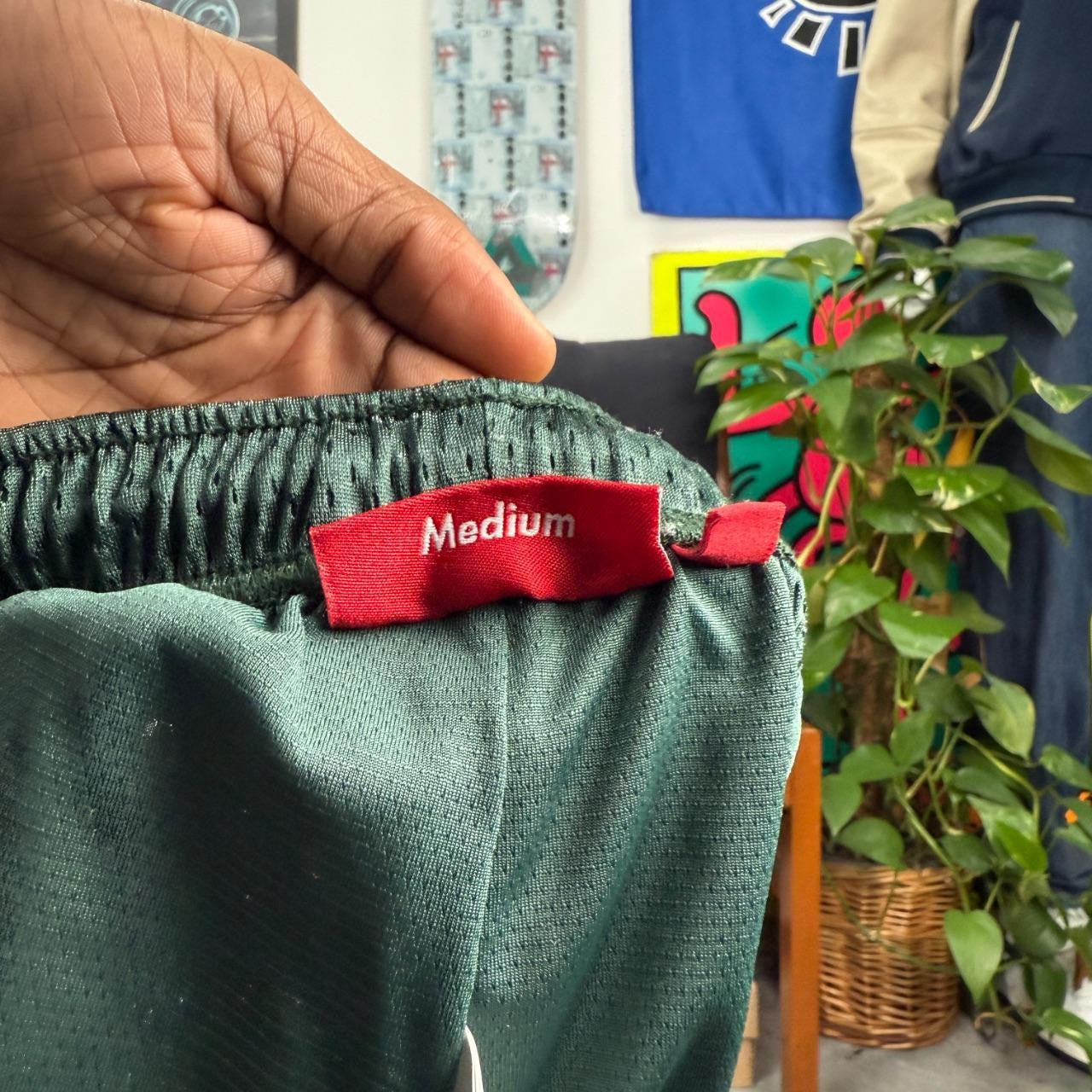 SUPREME SS25 VARSITY MESH SHORTS