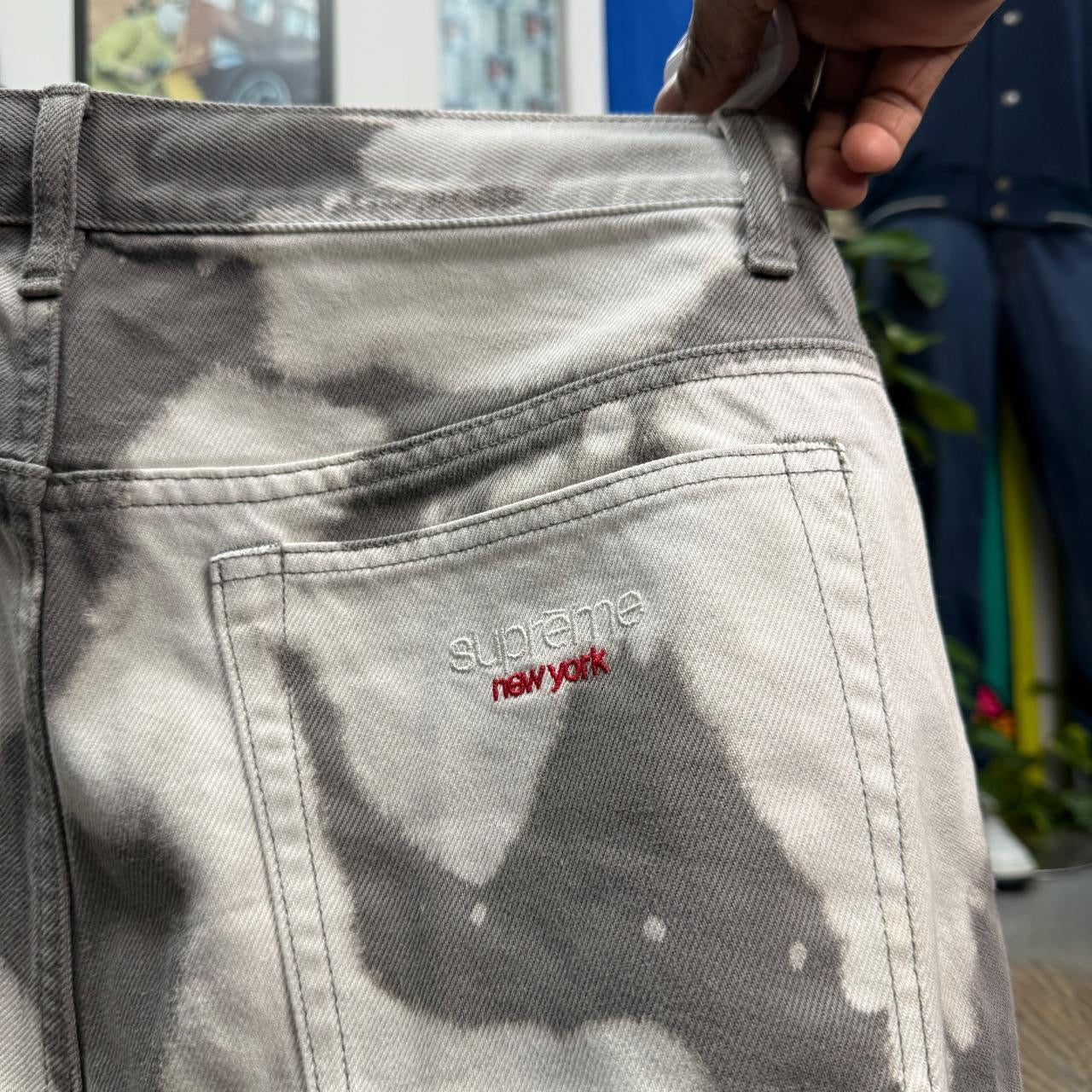 SUPREME SS25 BLEACHED BAGGY JEANS