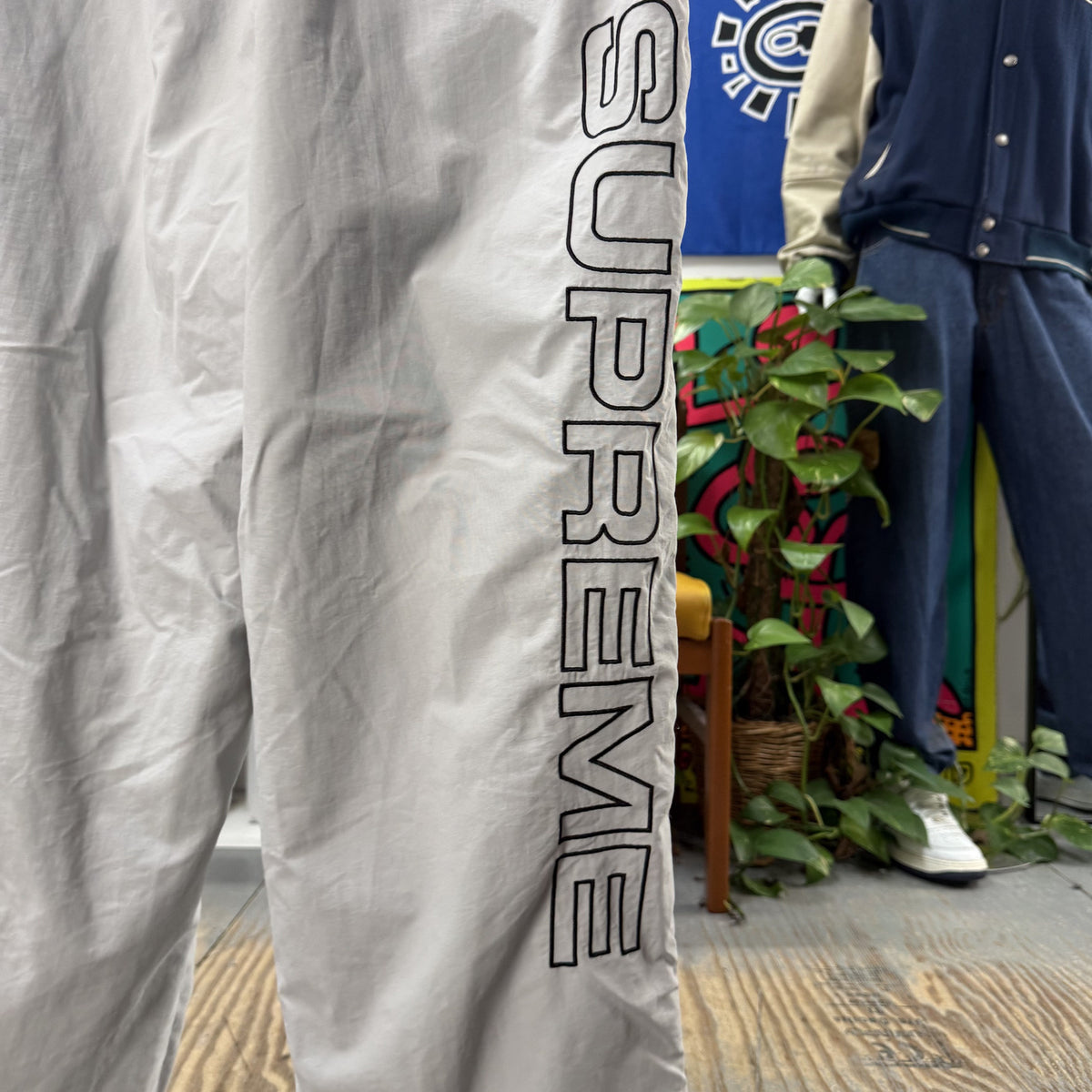 SUPREME FW24 GREY SPELLOUT EMBROIDERY TRACK BOTTOMS