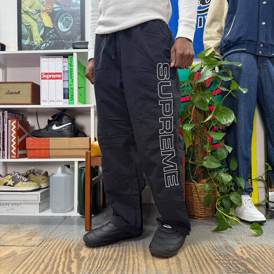 SUPREME FW24 SPELLOUT EMBROIDERED TRACK PANT