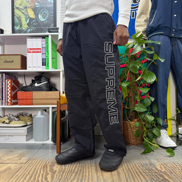 SUPREME FW24 SPELLOUT EMBROIDERED TRACK PANT