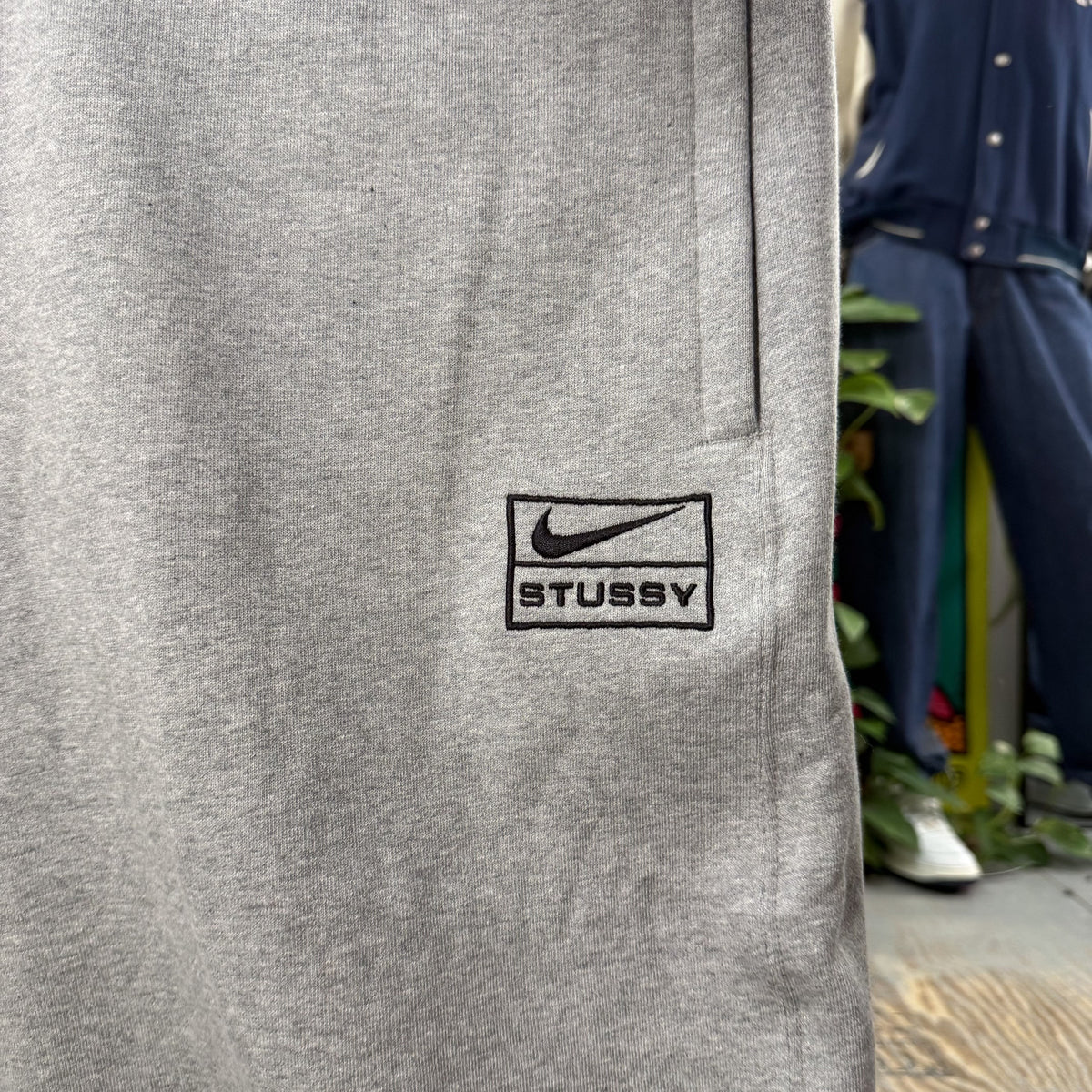 STUSSY X NIKE GREY BAGGY JOGGERS