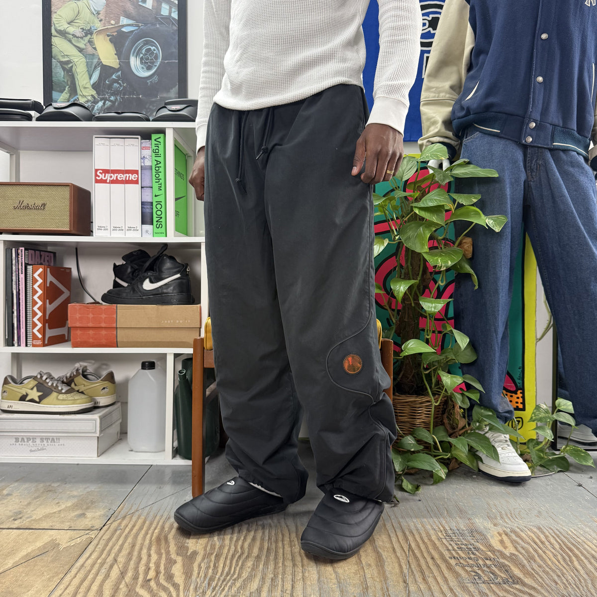 SUPREME JORDAN SS26 BLACK TRACK PANTS