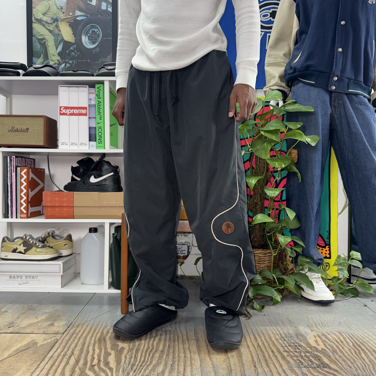 SUPREME JORDAN SS26 BLACK TRACK PANTS