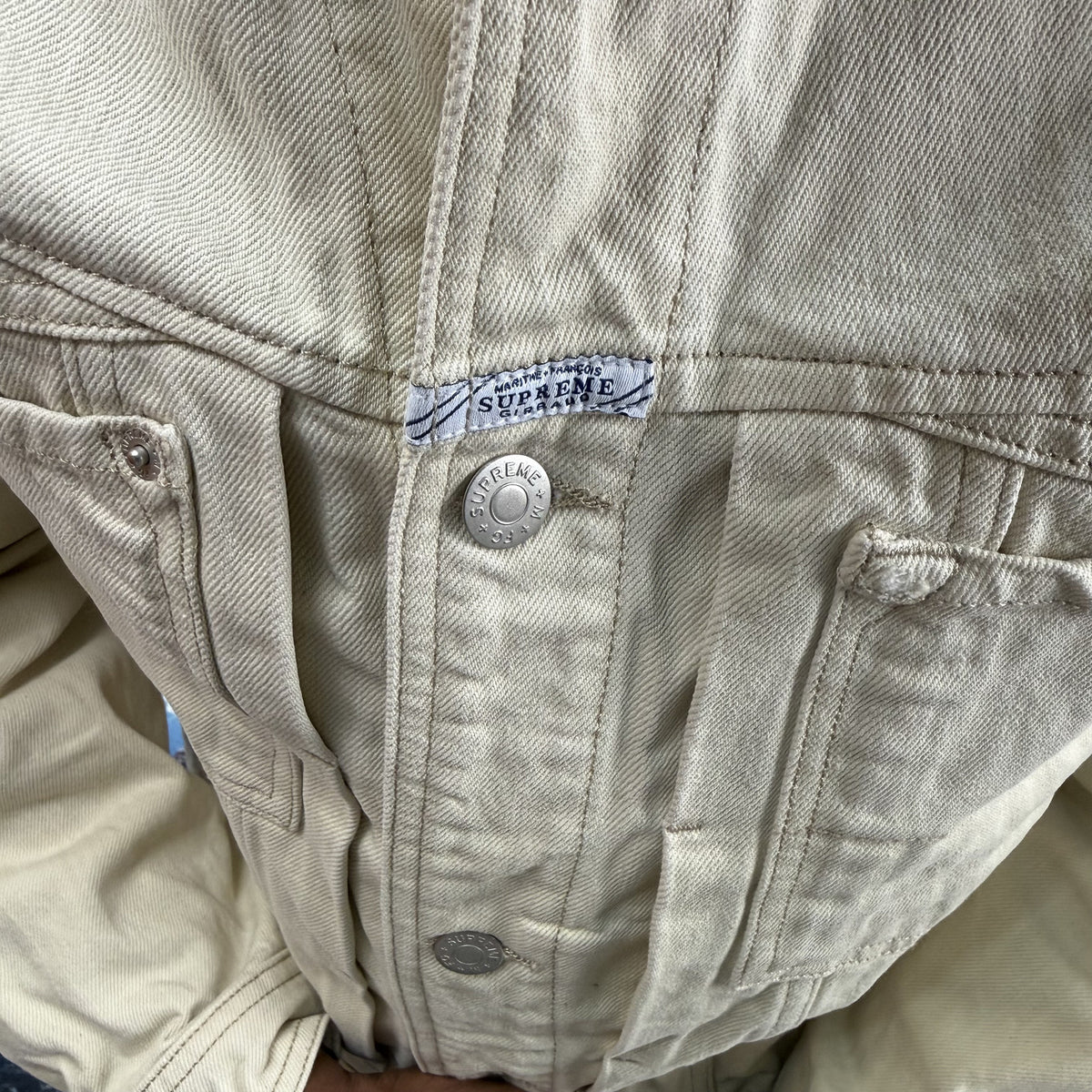 SUPREME MARITHE FRANCOIS GIRBAUD SS25 BEIGE DENIM TRUCKER JACKET