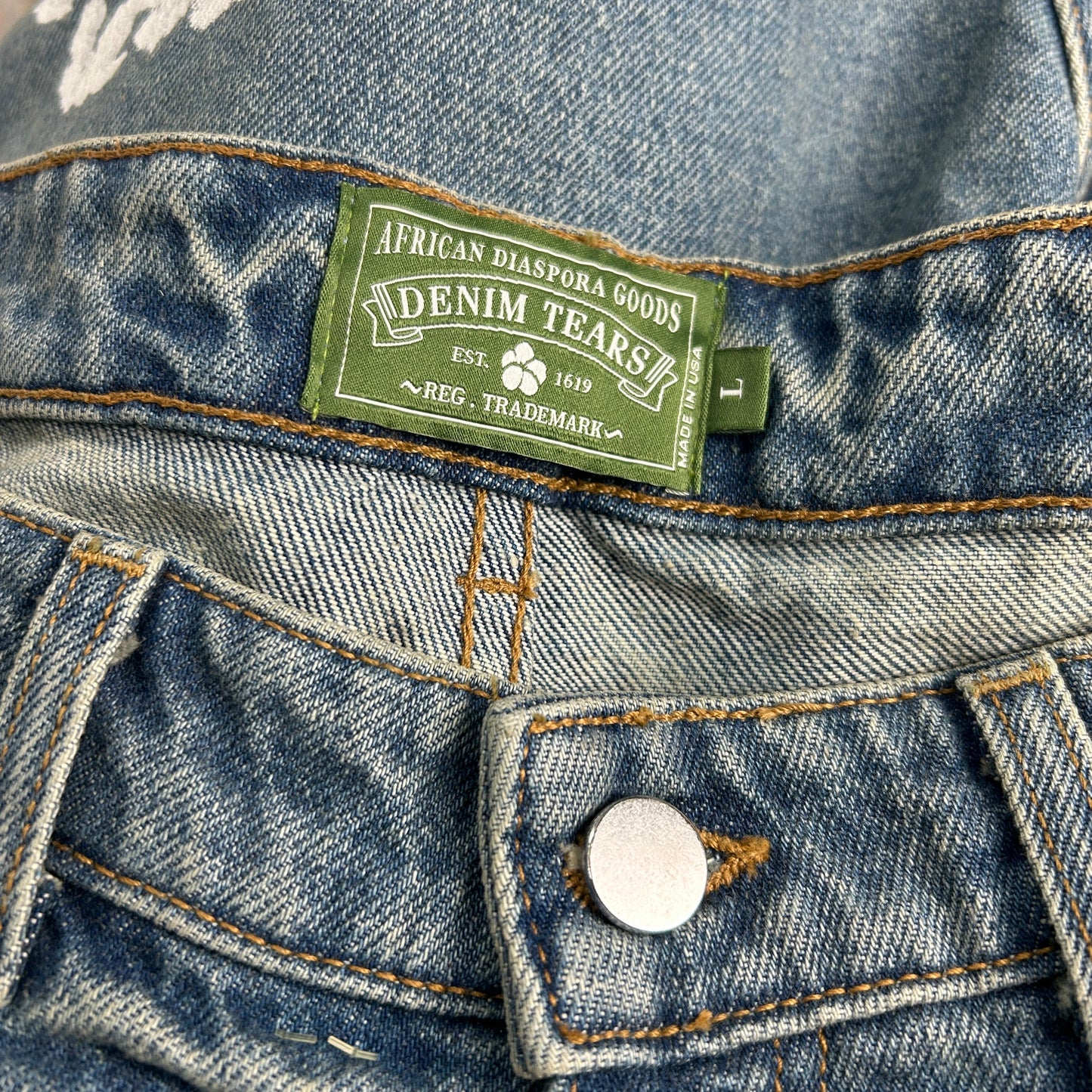 DENIM TEARS X LEVI FW23 WREATH LIGHT WASH JEAN SHORTS