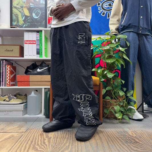 SUPREME SS25 OLD ENGLISH TRACK PANT