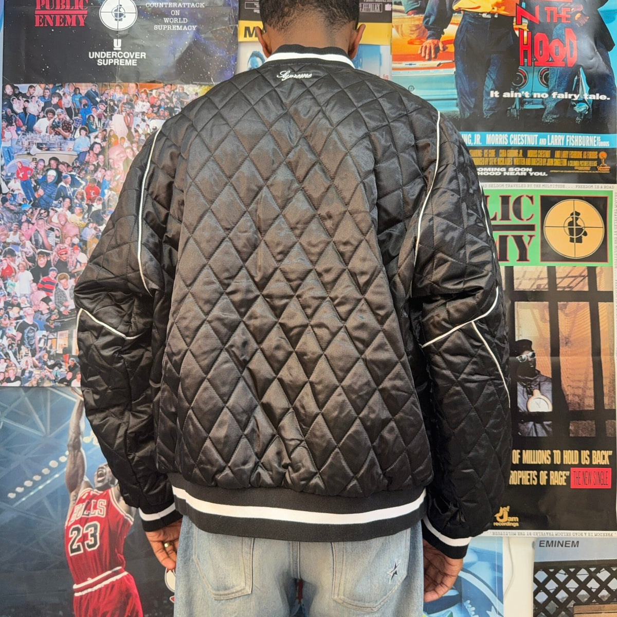 SUPREME FW26 CHAMPION QUILTED SATIN VARSITY BLACK JACKET