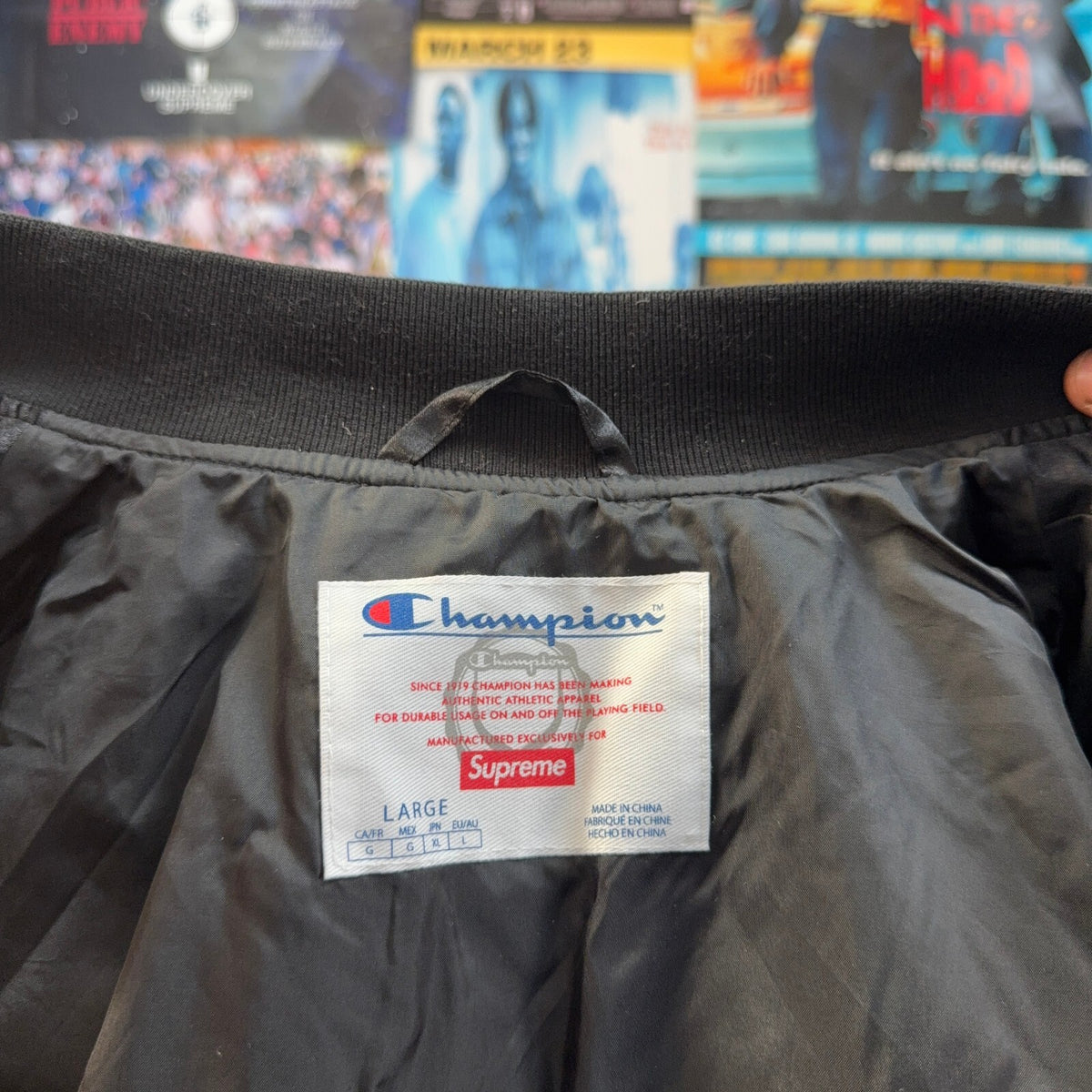 SUPREME FW26 CHAMPION QUILTED SATIN VARSITY BLACK JACKET